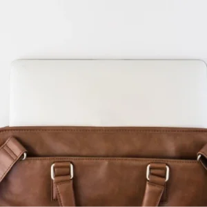 Brown briefcase with tablet