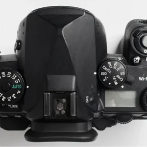 Hand holding photo camera